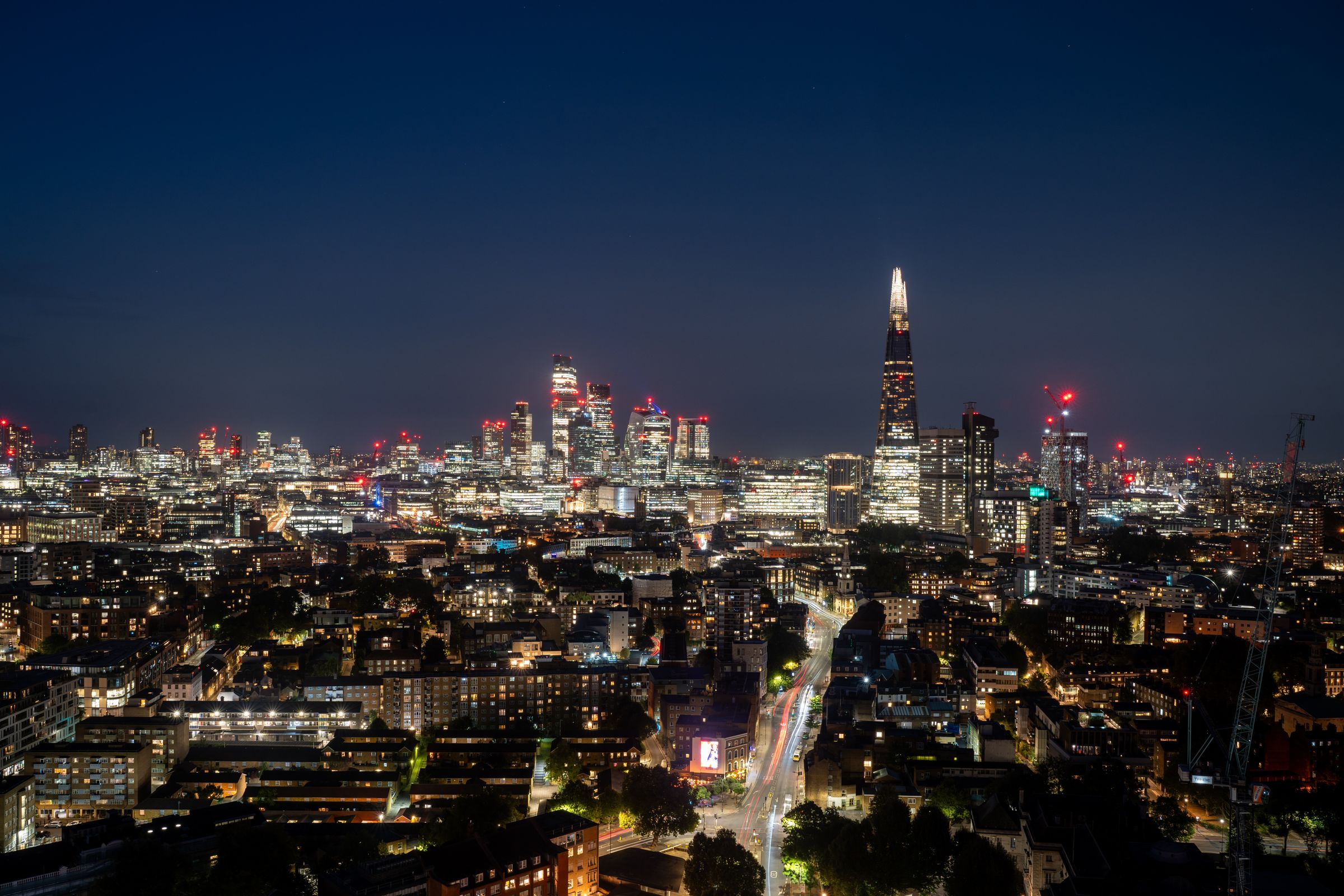 London skyline at night across the River Thames